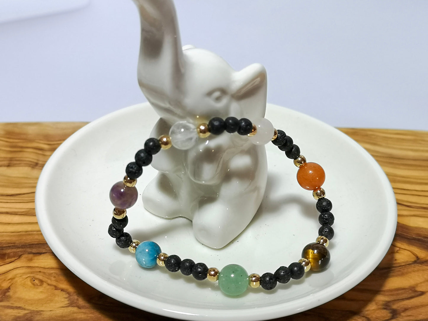 Lava stone bracelet and seven other stones
