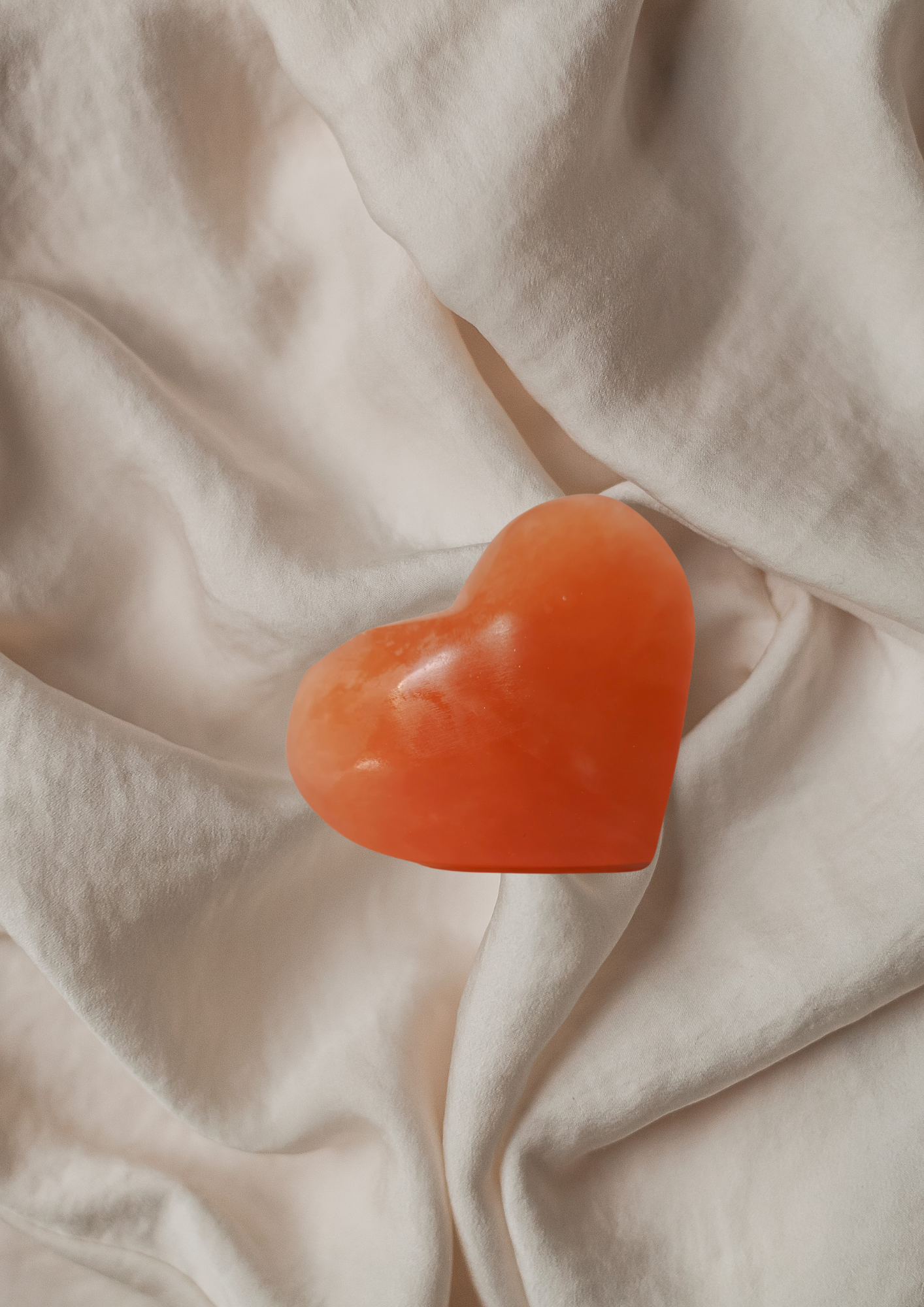 Orange selenite heart